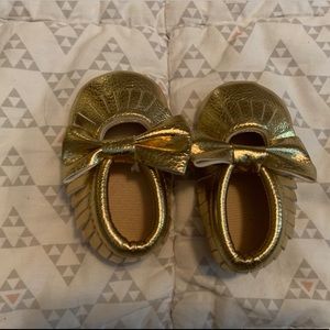 Infants gold moccasins